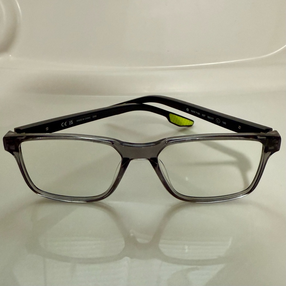 Nike 7160 027 Light Gray Crystal 
55-17-145 Eyeglasses Frame